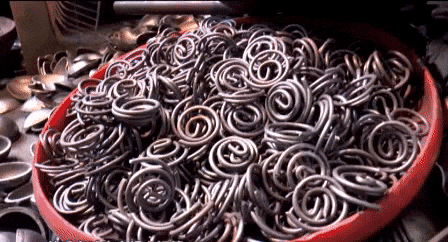 Welding chimes into half spheres and welding two half spheres together to form a ball.