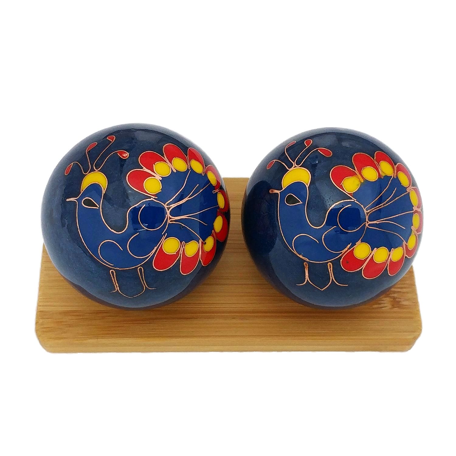 Peacock baoding balls on a bamboo display stand
